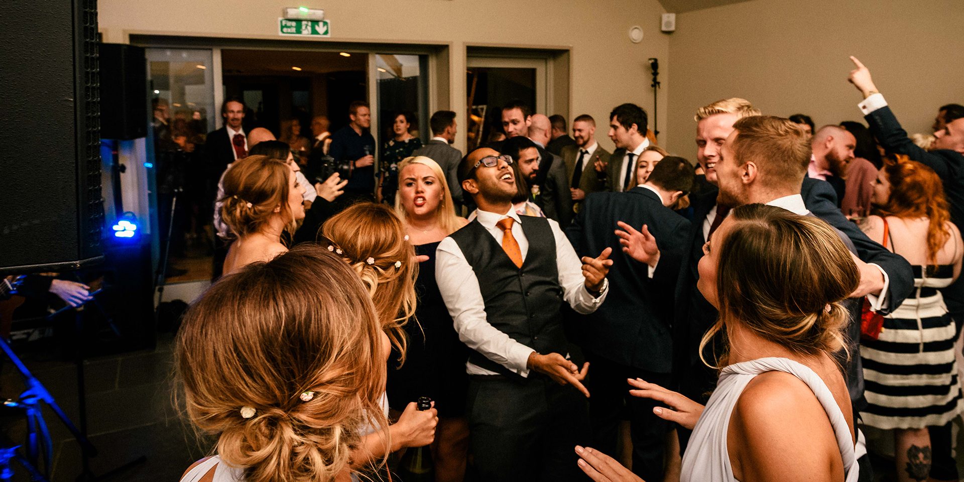 Wedding guests enjoy an evening reception at Blackwell Grange wedding venue in Warwickshire