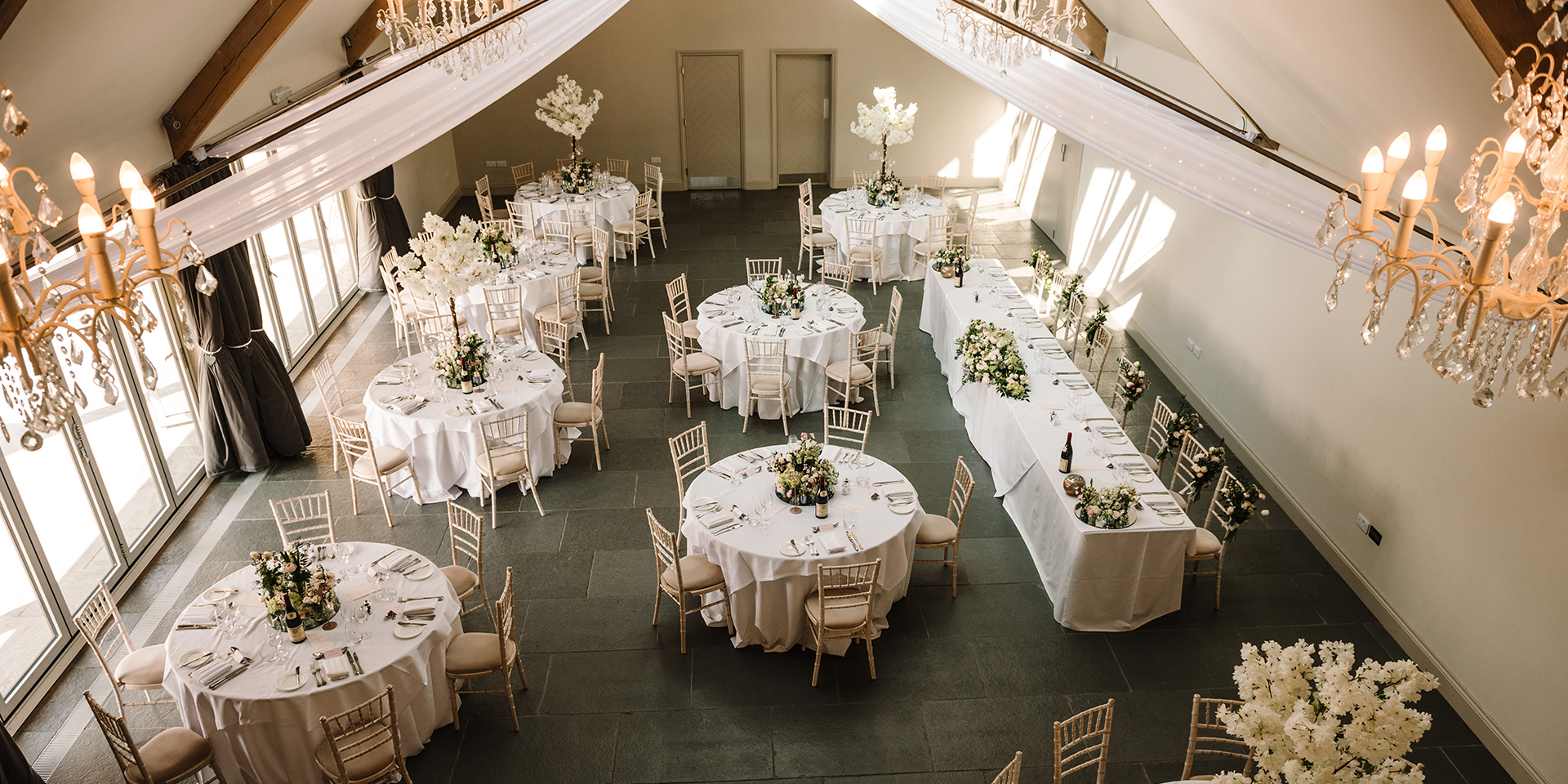 The Orchard Barn looked stunning decorated with white blossom trees